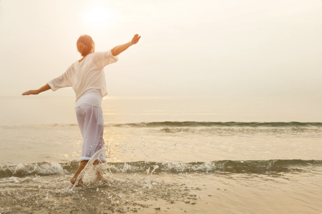 Happy woman on the beach